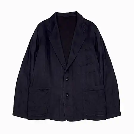 The Work Jacket by Kaptain Sunshine is made from a densely woven linen and features three patch pockets and a two and a half button closure with detailed button backs. A relaxed summer jacket that can even stretch to the autumn. 100% Linen. Made in Japan.