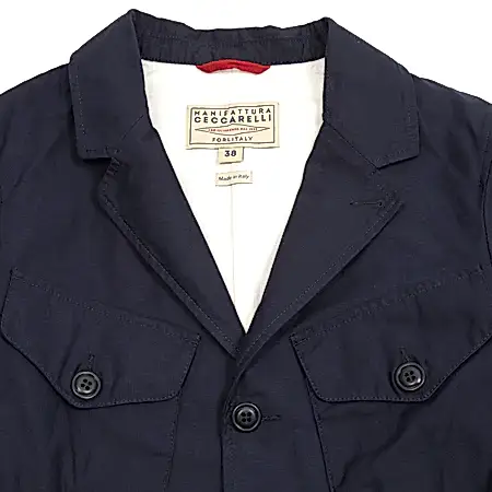 The Bush Jacket has two welt pockets at the bottom and two flap pockets on the chest with a central angle to ease access with opposite hand. This style features a full button closure with buttoned cuffs.  100% Cotton Sateen.  Made in Italy.