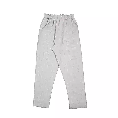 The Perfumer Trouser is a relaxed loose tapered fit with a drop crotch, two angled front patch pockets, and an elasticated waist with inner drawstring closure.  100% Linen.  Made in Poland.