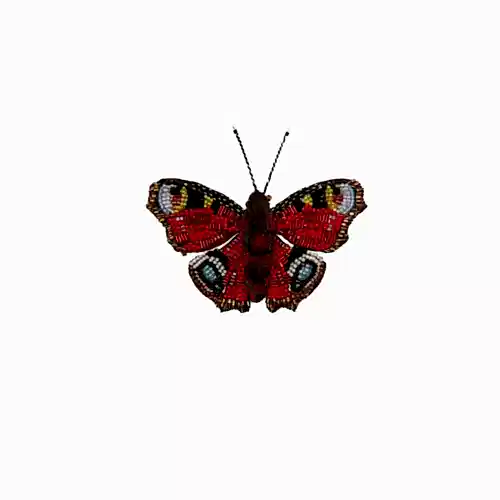 Red beaded butterfly brooch. 